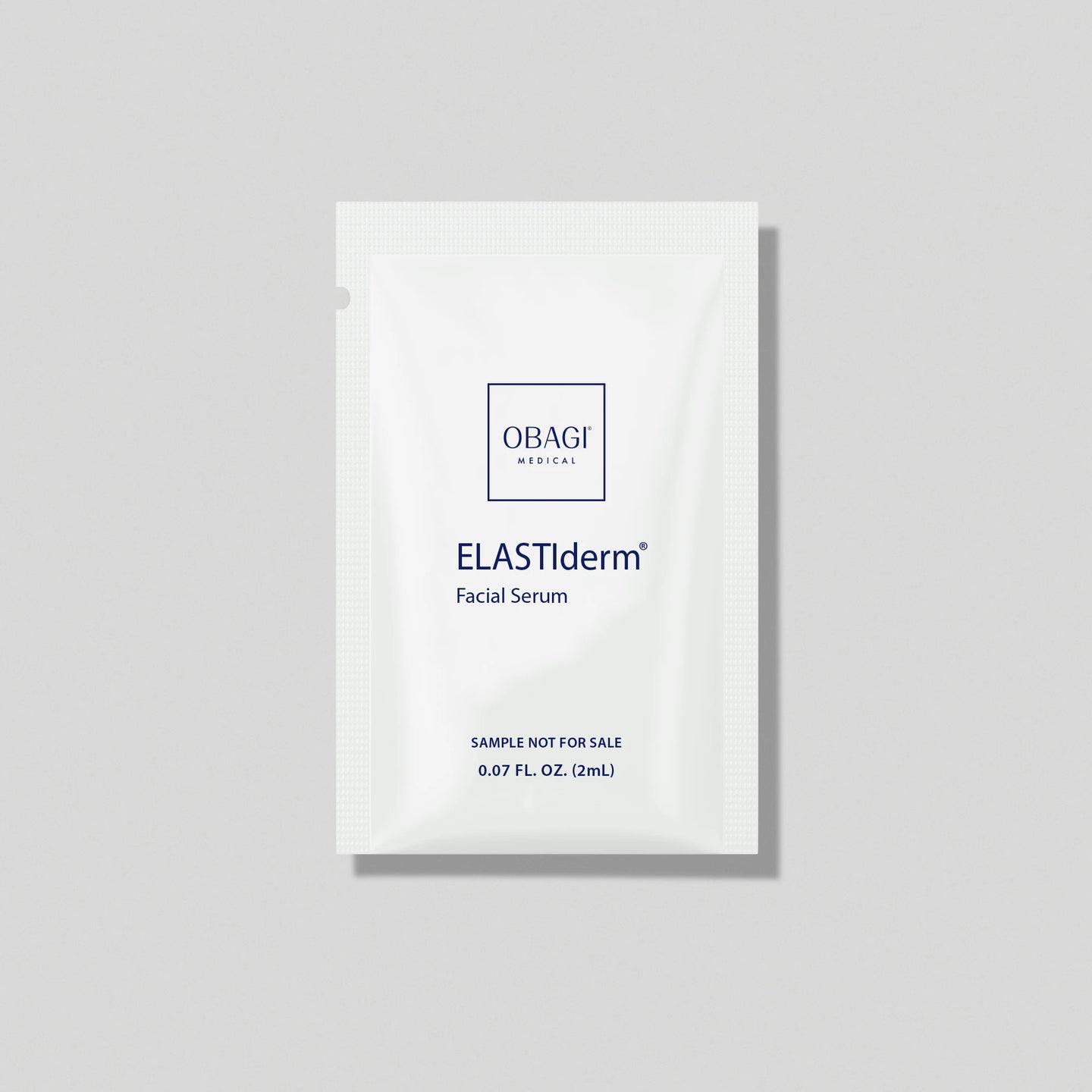 ELASTIDERM FACIAL SERUM SACHET SAMPLE IMAGE 2ML ON GREY BACKGROUND